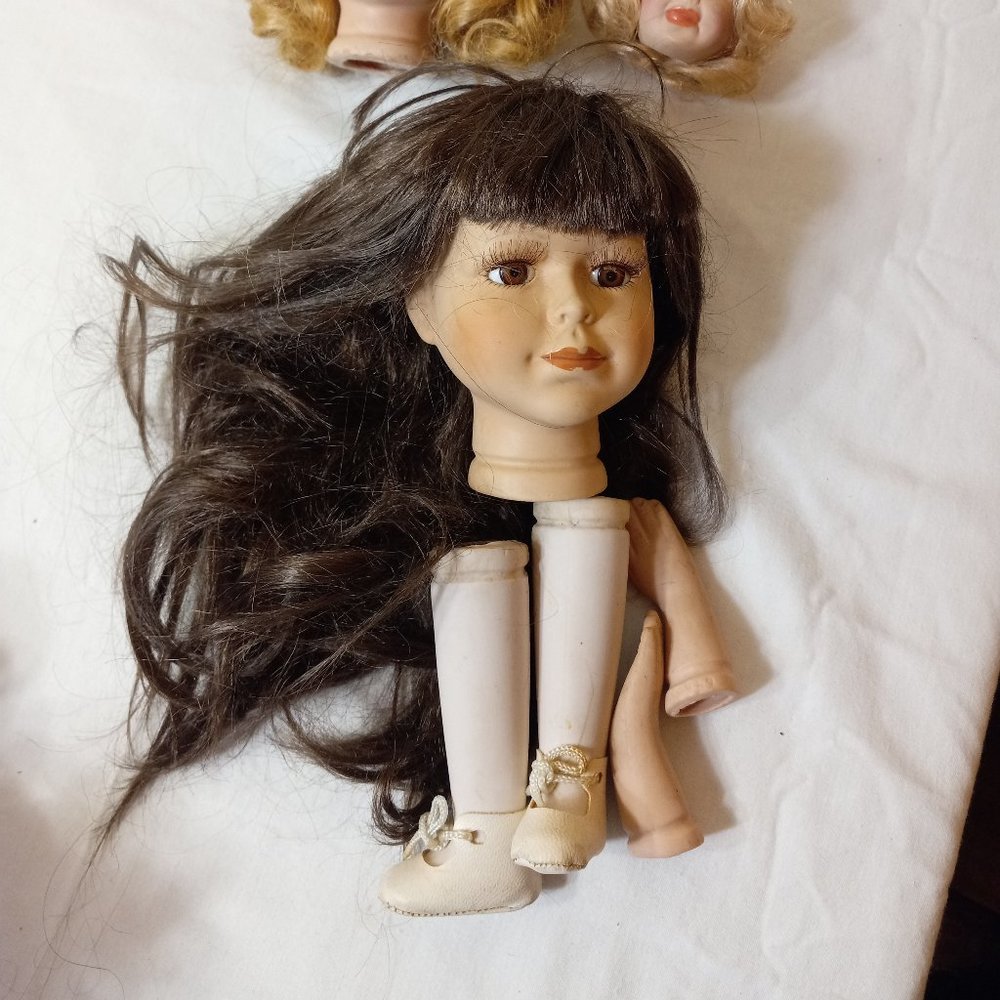 Three Porcelain Doll Heads One set of Hands and Feet - Picture 3 of 5